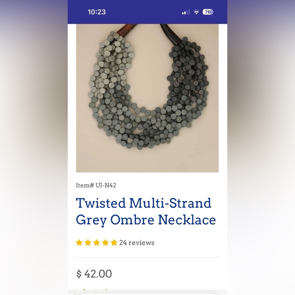Unique necklace with multiple disc strands and horned clasp